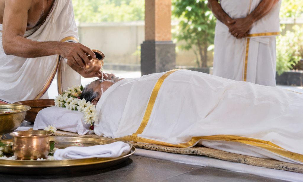 Antim Snanam and Vastradharana ritual before cremation